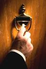 Picture hand door knocker